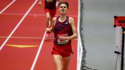 Rocky Hansen wins the high school boys mile at the New Balance Indoor Grand Prix.