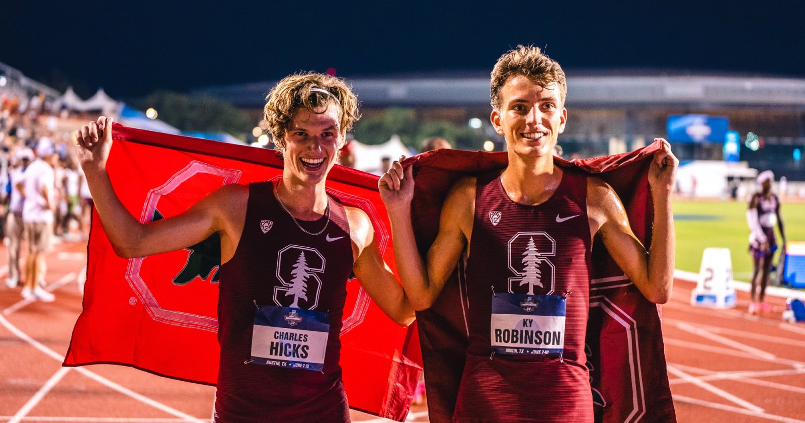 Charles Hicks and Ky Robinson celebrate after Stanford went 1-2 in the 10,000m at the NCAA Outdoor Track and Field Championships.