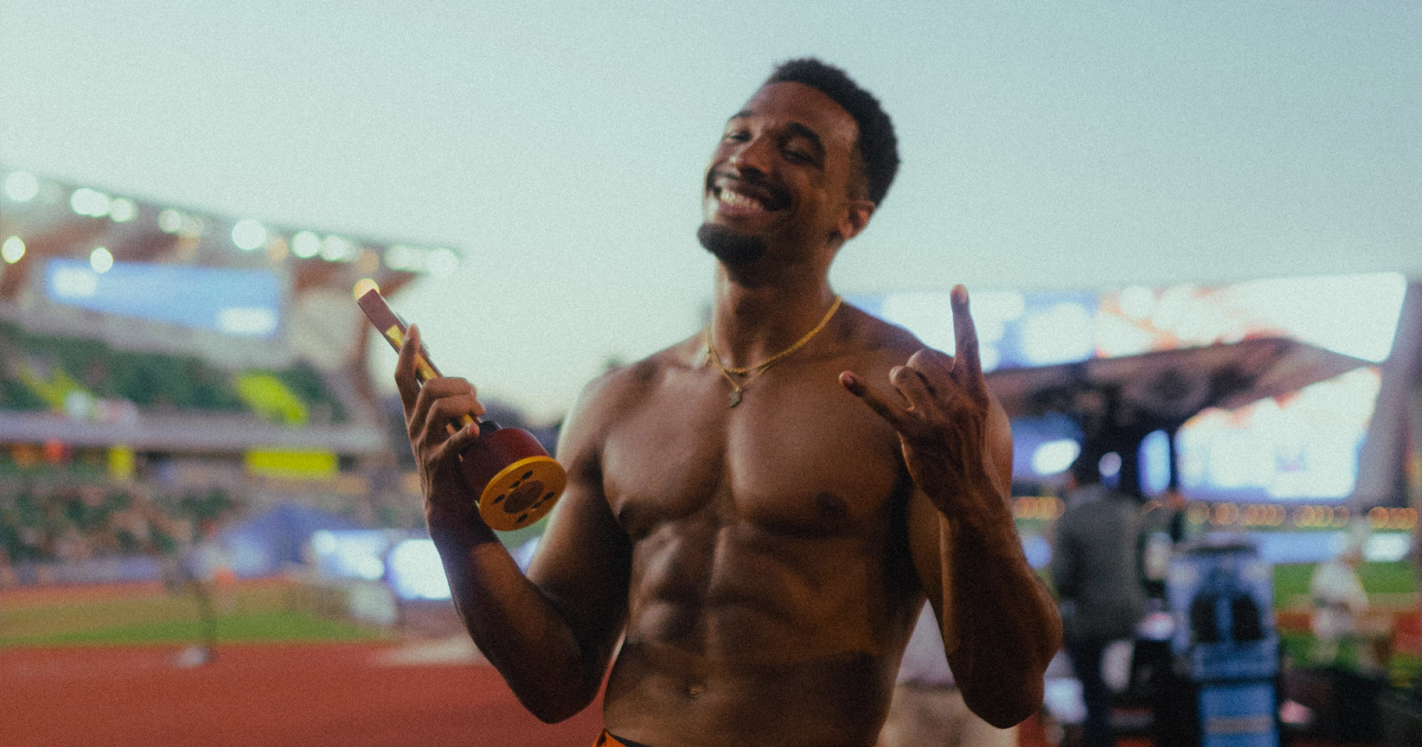 Leo Neugebauer celebrating after breaking his own collegiate decathlon record